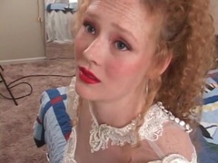 FuckingChickas presents: Redhead in wedding dress models her pussy