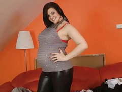 FuckingChickas presents: Pregnant lady oils up her huge belly and big tits - preggo