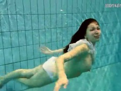 FuckingChickas presents: Girl in white panties swims in pool
