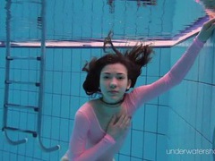 FuckingChickas presents: Leggy girl goes swimming in her leotard