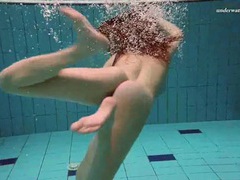 FuckingChickas presents: Underwater with a busty naked babe as she swims