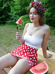 FuckingChickas presents: Nice belarusian stunner Rokki removes all clothes on a blanket in a backyard