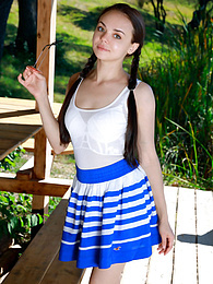 FuckingChickas presents: Fresh-Faced russian beauty Mia Grandy gets totally naked on a picnic table in a garden
